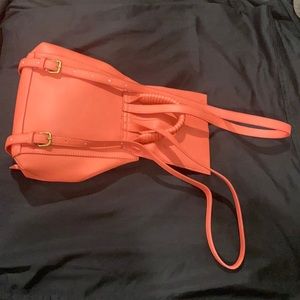 Salmon colored backpack
